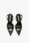 A pair of Victoria Beckham Pointy Toe Sling back in Black Calf with gold embellishments on the toe and ankle straps with buckles.