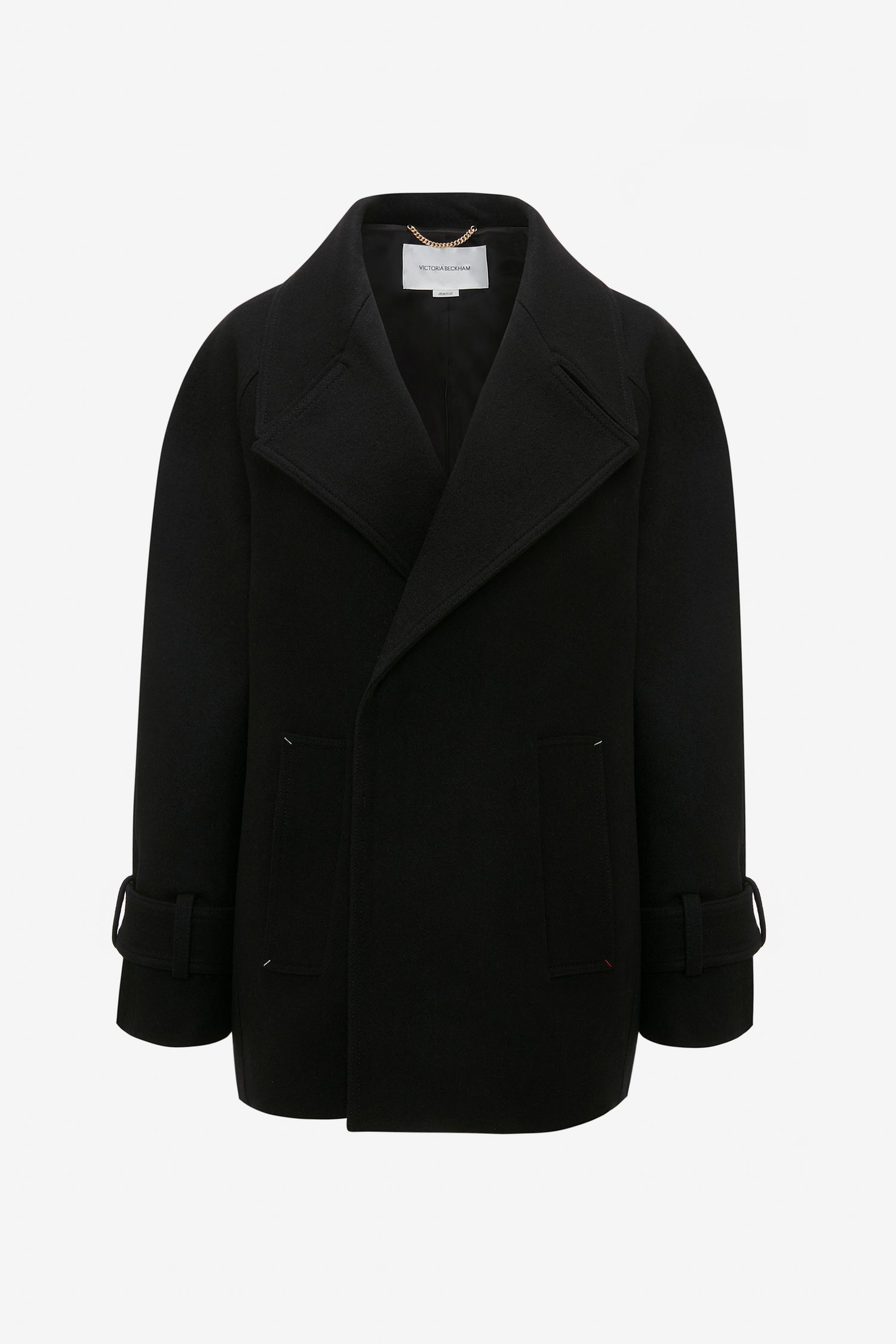 An Oversized Pea Coat In Black by Victoria Beckham, crafted from luxurious melton wool with masculine tailoring, features wide lapels, front pockets, and adjustable cuffs, displayed on a plain white background.