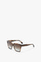 Brown tortoiseshell Soft Square Frame Sunglasses In Striped Khaki Havana by Victoria Beckham with gradient lenses, set against a plain white background.