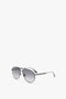 A pair of V Metal Pilot Sunglasses In Grey Gradient with dark, gunmetal grey gradient lenses and a thin, black metal frame, placed on a white background. These stylish aviators are Victoria Beckham's favorite accessory for any occasion.