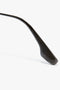 Close-up of the black, elongated arm of Victoria's favorite V Metal Pilot Sunglasses In Grey Gradient by Victoria Beckham, featuring a textured pattern and a slight curve.