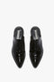 A pair of Victoria Beckham Flat Lace Up Mules In Black Leather, reminiscent of an Oxford brogue, viewed from above.