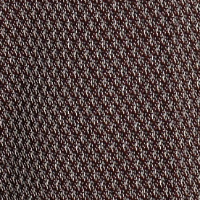 Close-up image of a textured fabric featuring a repetitive diamond pattern in shades of brown and black, reminiscent of the Victoria Beckham Alina Trouser In Tobacco.