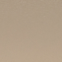 A plain, beige surface with faint texture visible, reminiscent of a structured design found on a Victoria Beckham Victoria Crossbody Bag In Taupe Leather.