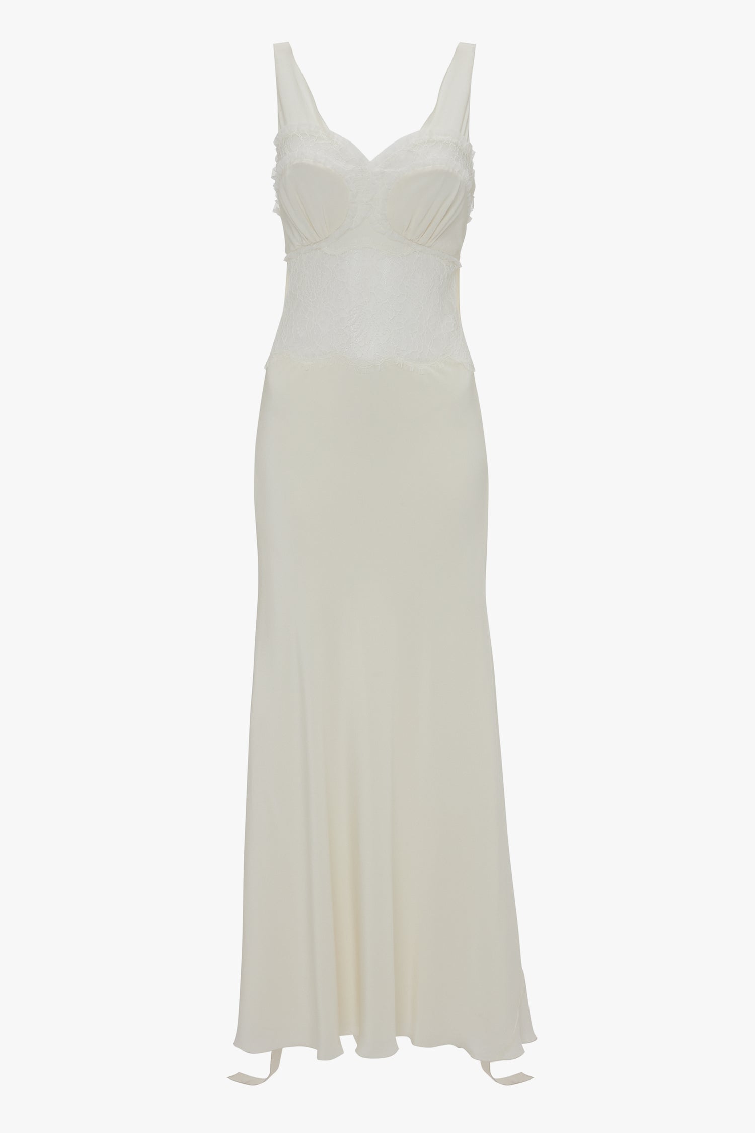 A long, white sleeveless midi dress with a fitted bodice and flowing skirt. The Ruffle Detail Midi Dress In Ivory by Victoria Beckham features lace panels around the bust and midsection.