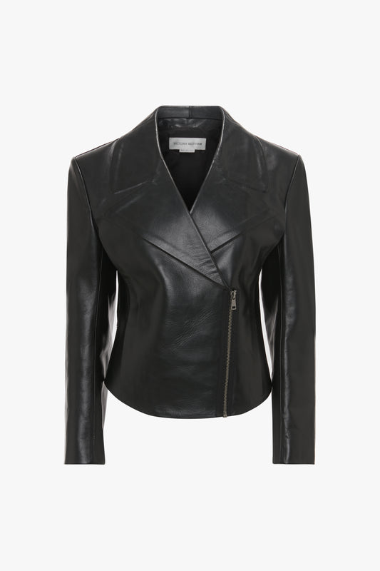 Victoria Beckham Tailored Leather Biker Jacket In Black with a modern classic asymmetrical front zipper closure and a small standing collar, displayed on a white background.