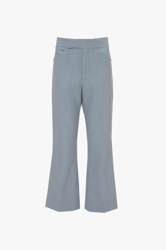 Gray women's tailored pants with a slightly flared leg, front pleats, and a mid-rise waist on a plain white background. These Exclusive Wide Cropped Flare Trousers In Marina by Victoria Beckham embody a 1970s-inspired style that adds a touch of retro elegance to any wardrobe.