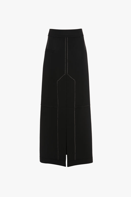 Deconstructed Floor-Length Skirt In Black by Victoria Beckham with white stitching details, featuring front and side pockets and a straight hemline that provides an elongating silhouette.
