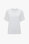 A Victoria Beckham Victoria T-Shirt In White, made from 100% organic cotton, on a white background.