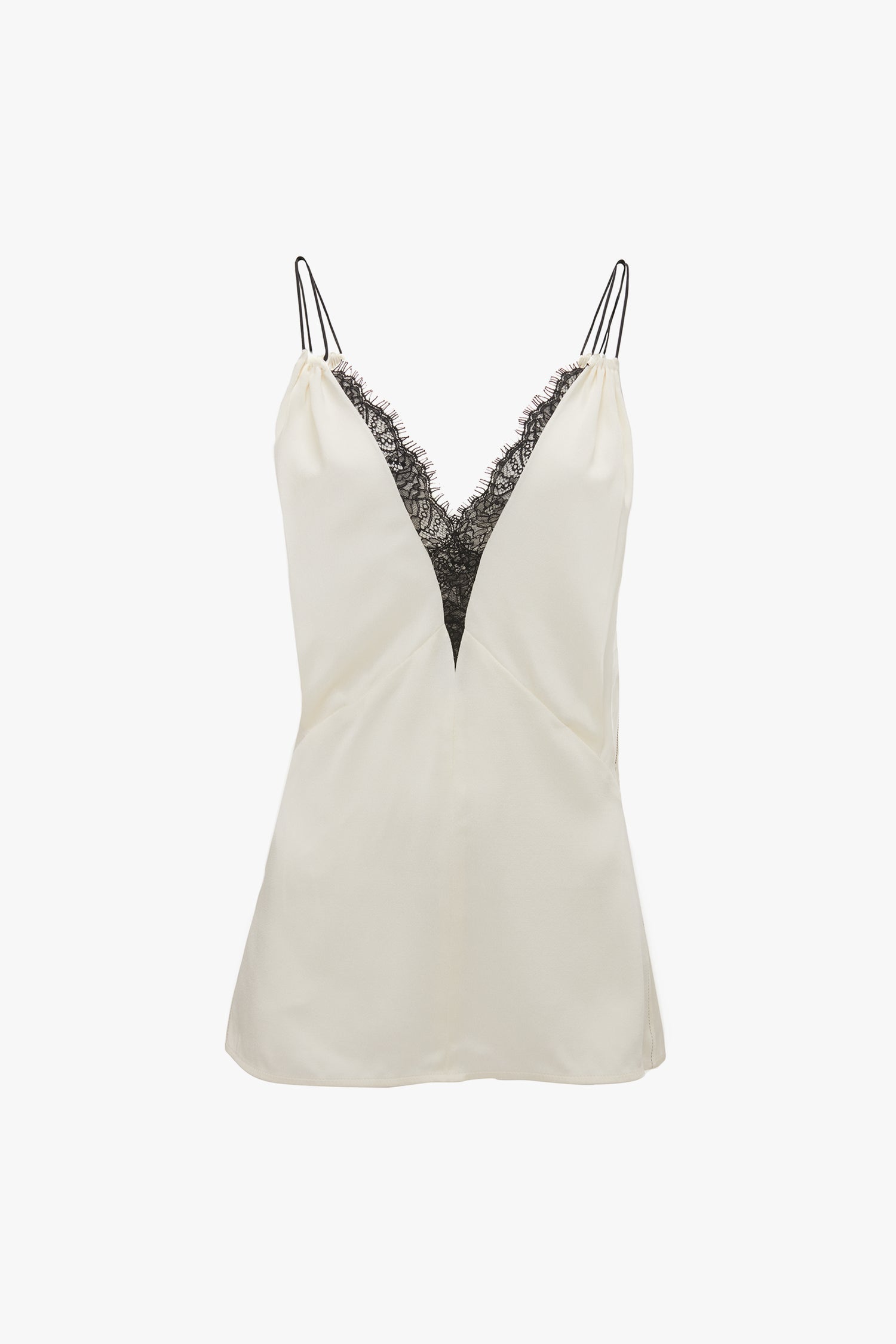 A Lace Detail Cami Top in Harvest Ivory by Victoria Beckham in luxurious crepe back satin, featuring a deep V-neckline adorned with black lace trim and thin shoulder straps.