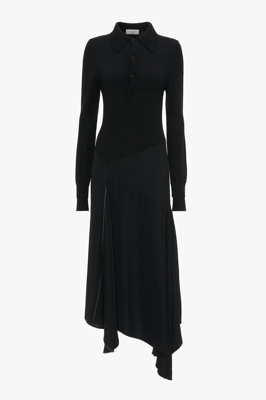 A Victoria Beckham Henley Shirt Dress In Black, featuring a collared neckline, an asymmetric waist, and an asymmetrical hemline.