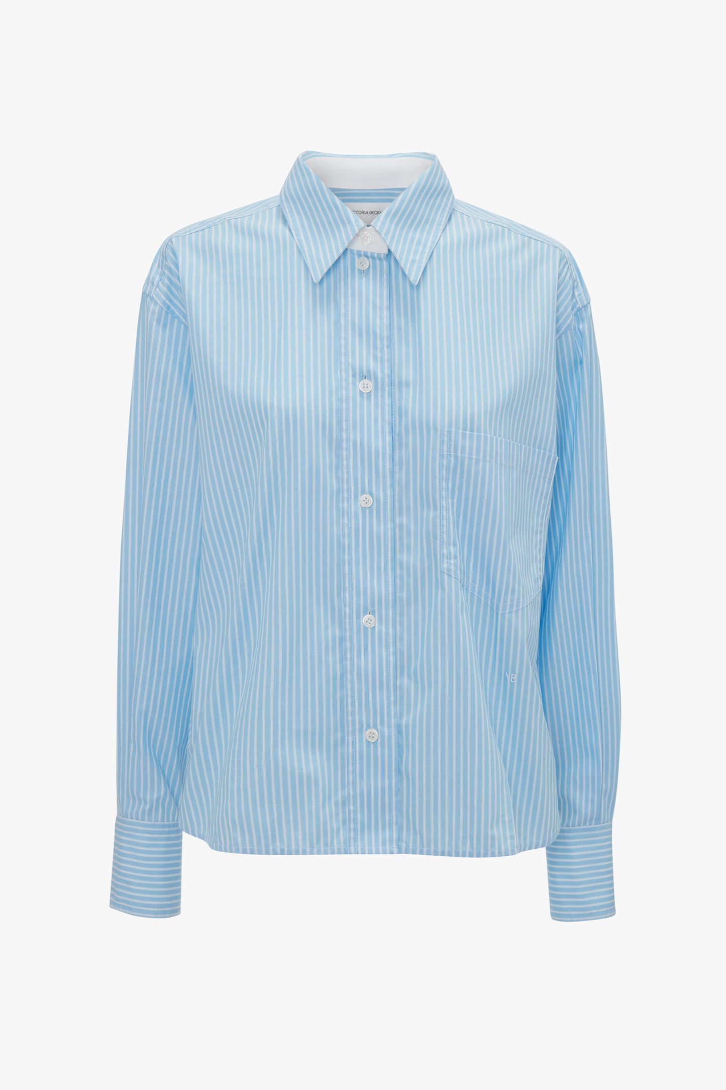 Light blue-and-white striped button-up shirt with long sleeves and a collar, inspired by Victoria Beckham's chic style, on a plain white background.