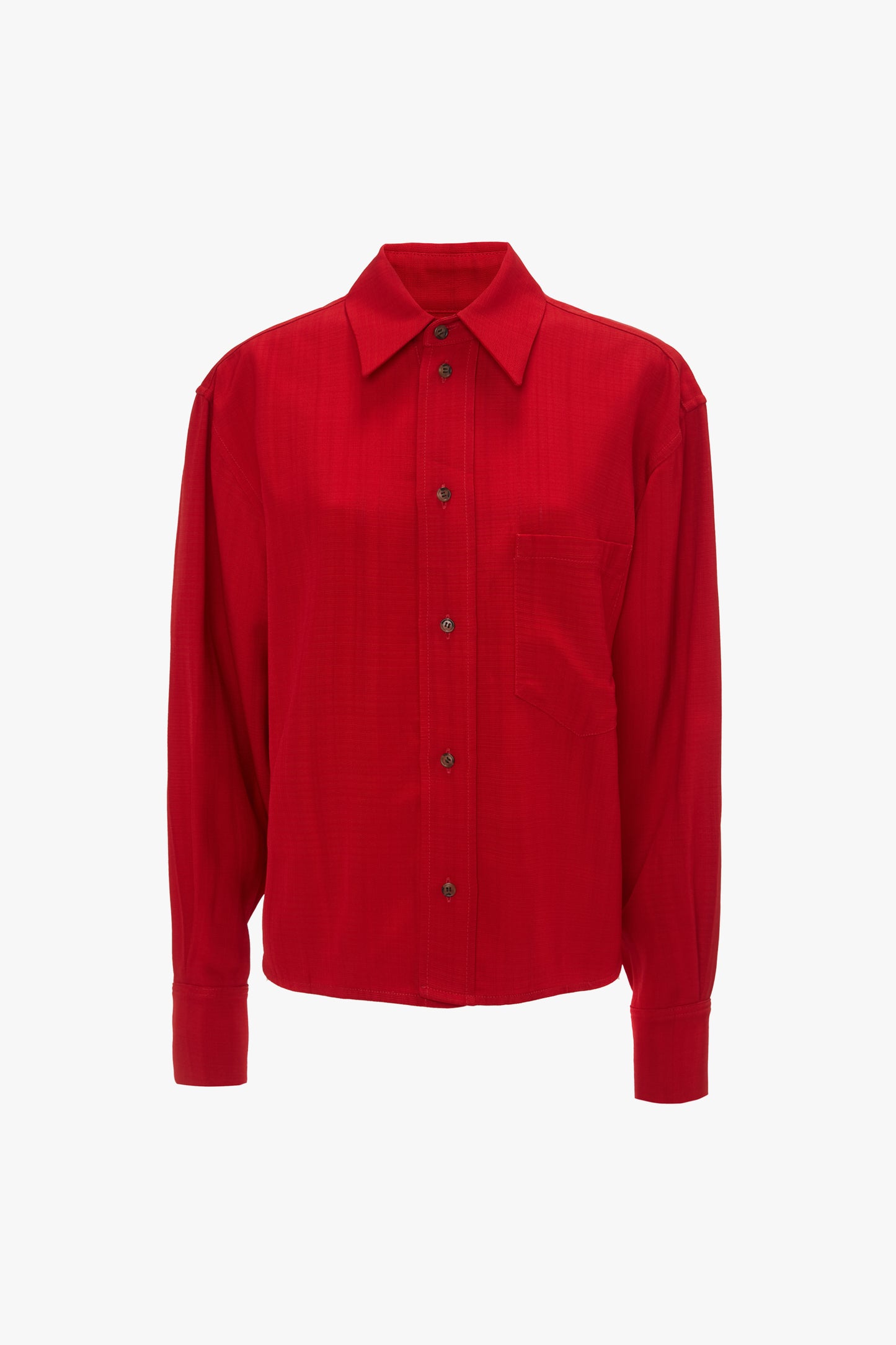 A Victoria Beckham Cropped Long Sleeve Shirt In Carmine with a front pocket on the left side, featuring a masculine-inspired design, shown against a white background.