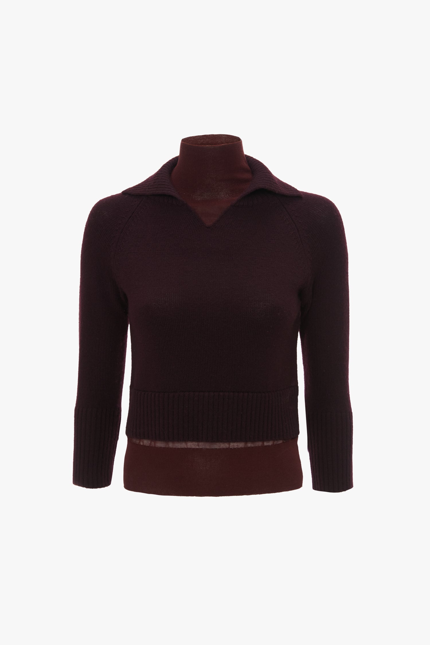 A dark brown, long-sleeved ribbed sweater with a V-shaped neckline and a fold-over collar crafted from mid-weight merino wool, exhibited on a mannequin, is the Double Layer Top In Deep Mahogany by Victoria Beckham.