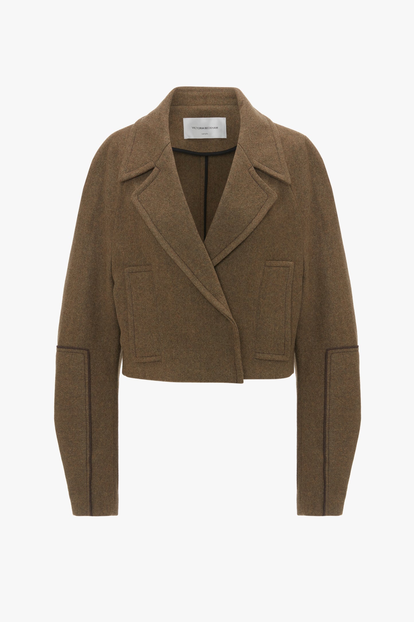 A Cropped Pea Coat In Khaki from Victoria Beckham, made of Merino wool, featuring a wide lapel collar and front patch pockets, with long sleeves and a minimalist design.