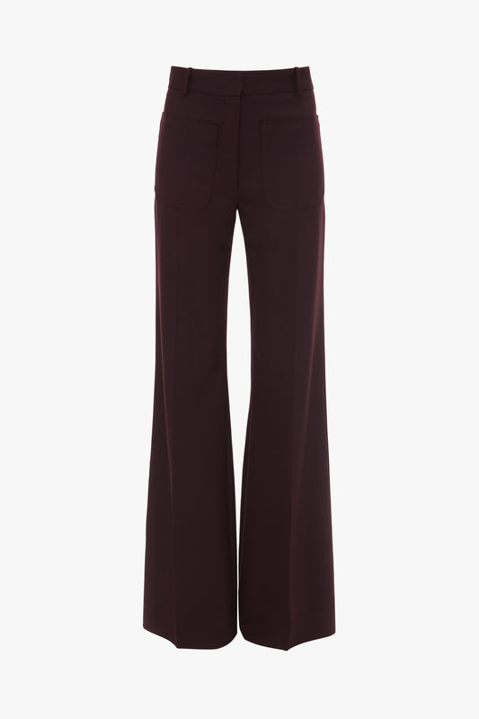 Back view of the Victoria Beckham Alina Trouser In Deep Mahogany, made from recycled wool, featuring two back pockets and belt loops.
