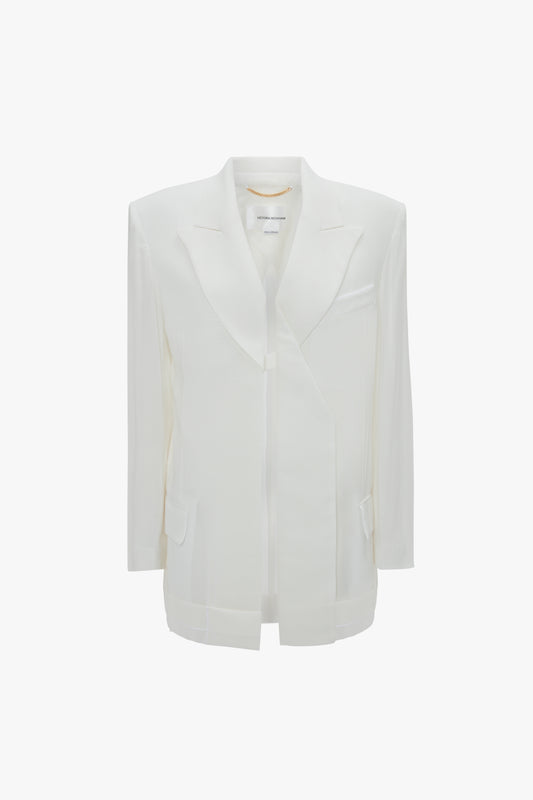A white, Fold Detail Tailored Jacket In White by Victoria Beckham with a satin collar, notched lapels, long sleeves, and front pockets.