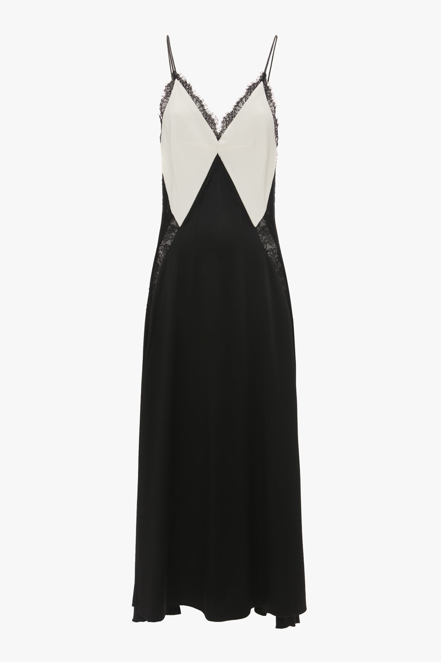 A Victoria Beckham V-Neck Lace Insert Cami Dress In Ivory with thin straps, featuring a black crepe back satin skirt and a white bodice accented with delicate black lace trim.