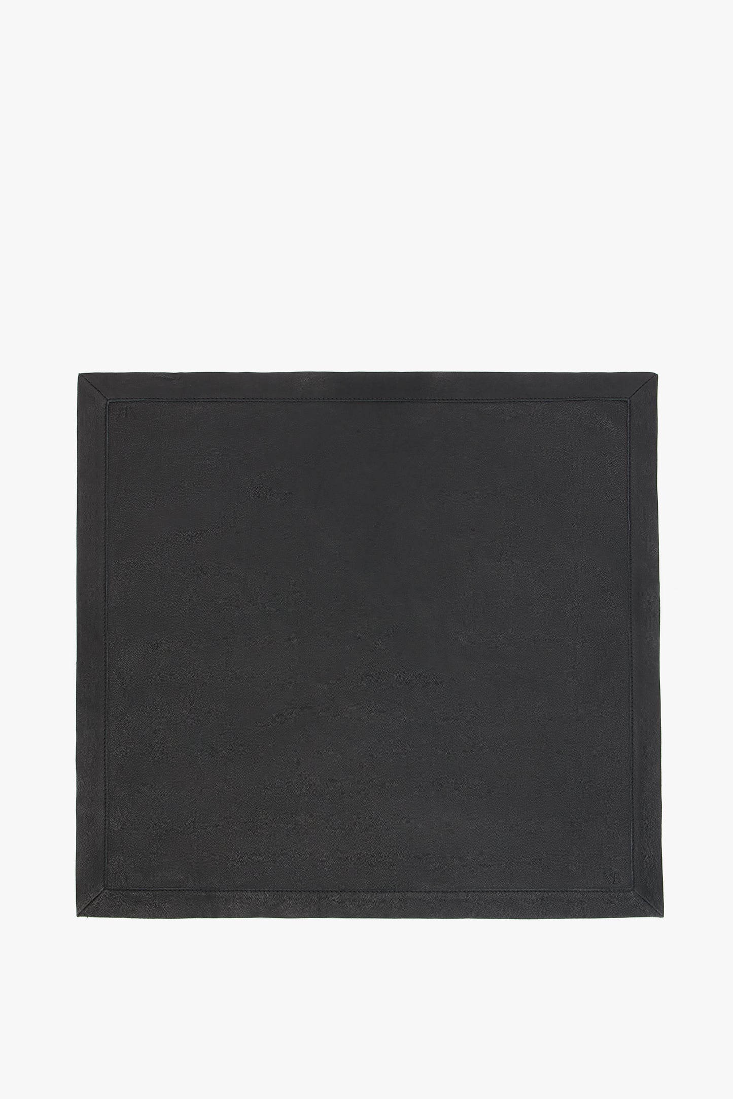 A rectangular, classic Leather Scarf In Black by Victoria Beckham with a simple, plain design and stitched border, crafted from supple leather, set against a white background.