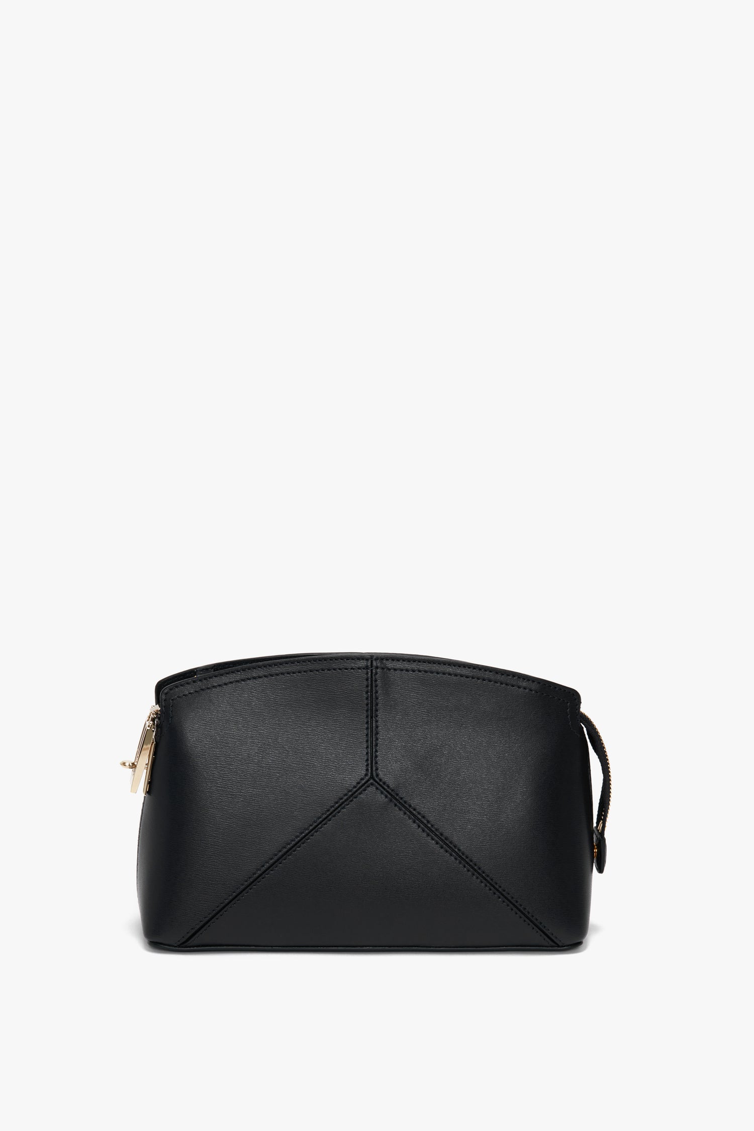 A Victoria Beckham Victoria Crossbody Bag In Black Leather made from textured calf leather, featuring a gold zipper and stitch detailing on the front, against a white background.