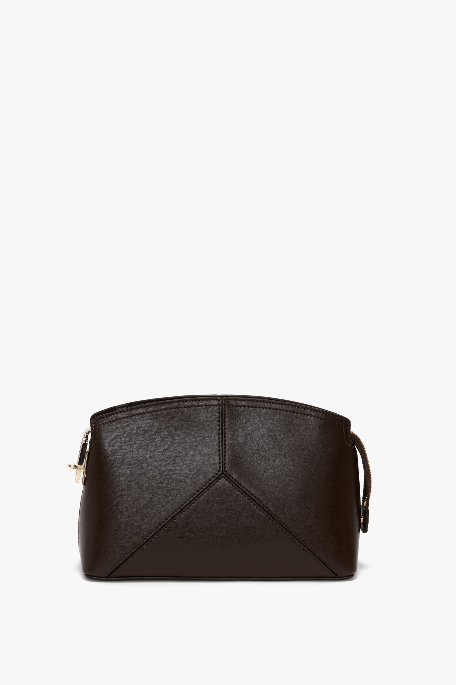 A small, structured Exclusive Victoria Crossbody Bag In Brown Leather by Victoria Beckham with sleek geometric lines, featuring a zipper closure and a short adjustable strap.