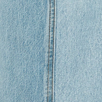 Close-up image of light blue denim fabric with a visible centre seam detail running down the middle, showcasing the intricate craftsmanship of the Bianca Jean In Light Blue Denim by Victoria Beckham.