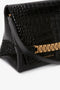 Close-up of a black leather Chain Pouch Bag With Strap In Black Croc-Effect Leather with a crocodile-embossed calf-leather pattern and a golden chain detail on the flap. The brand name "Victoria Beckham" is subtly visible on the bottom right.