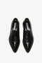 A pair of Pointy Toe Flat Lace Up In Black Croc-Effect Leather by Victoria Beckham viewed from above on a plain white background.