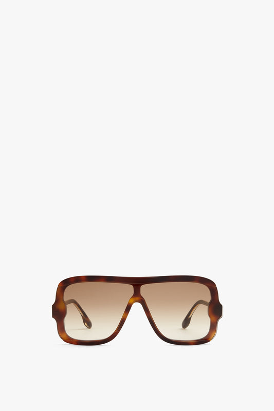 A pair of Victoria Beckham Layered Mask Sunglasses In Tortoise-Brown, viewed from the front.