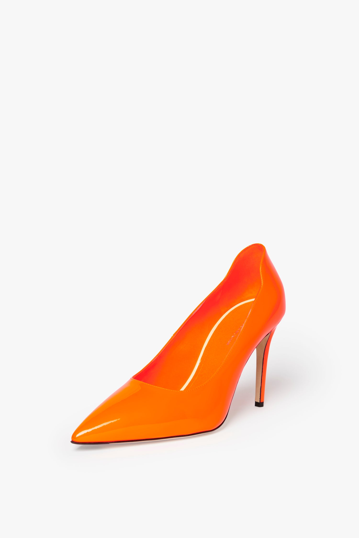 A single Victoria Beckham VB 90mm Pump In Fluorescent Orange with a pointed toe and 90mm stiletto heel set against a white background.