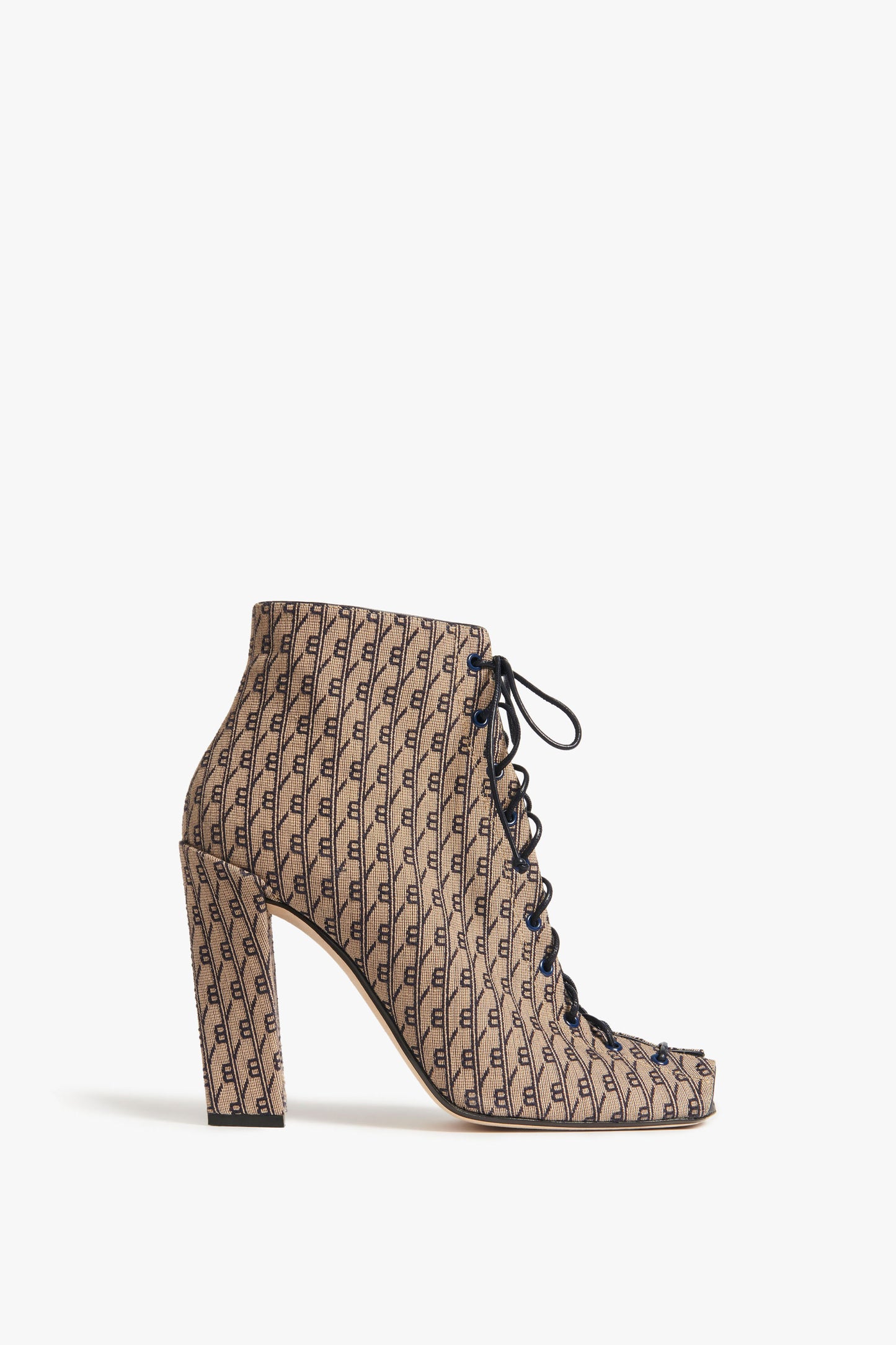 Introducing the Reese Boots In House Monogram Jacquard by Victoria Beckham: a tan high-heeled ankle boot featuring an all-over "F" monogram print, black laces, and a chic peep toe design.