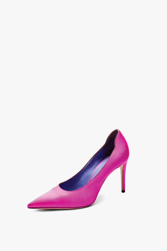 A single Victoria Beckham VB 90 Pump with a pointed toe, blue inner lining, and a 90mm stiletto heel handcrafted in Italy, all set against a white background.